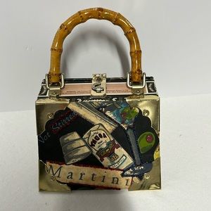 Super cute vintage “martini” cigar box purse with Rattan handle.